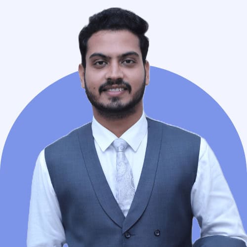 About Us 3 Professional young man in formal attire representing financial consulting and tax services at FinTaxYuga.